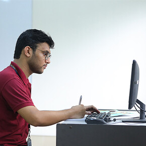 A prospective student working at a computer
